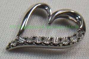 lot 10 image: Diamond, Sterling Silver Heart Pendant