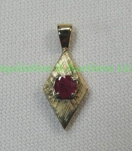 lot 28 image: 14K Gold, Ruby Pendant
