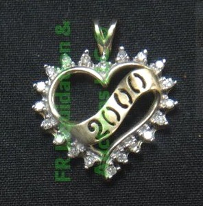 lot 46 image: 10K Gold, Diamond, �2000� Heart Pendant