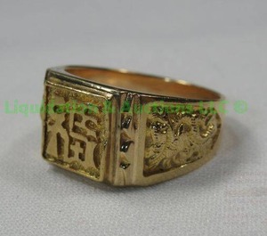 lot 64 image: 18K Gold Asian Symbols Ring
