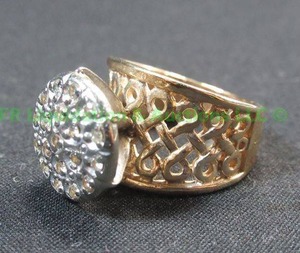 lot 74 image: 10K Gold, diamond hightop ring