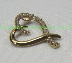 lot 119 image: 10K Gold, Cubic Zirconia, Heart Pendant
