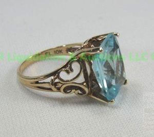 lot 121 image: 10K yellow Gold, synthetic aquamarine, ring