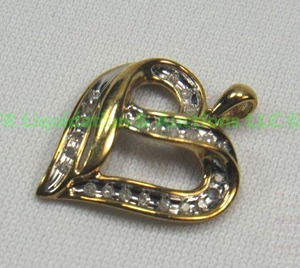 lot 131 image: 10K Gold, Diamond, Heart Pendant