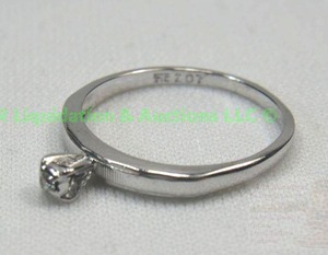 lot 142 image: 14k white gold tiny diamond ring