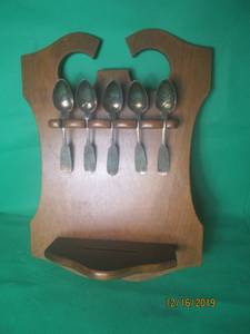 lot 89 image: SILVER SPOONS AND HOLDER