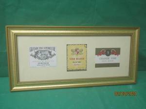 lot 195 image: VINTAGE FRAMED ALCOHOL LABELS 22.5 X 10.5
