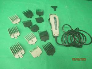 lot 213 image: WAHL THE DESIGNER CLIPPERS WITH 12 GUARDS MODEL 305G