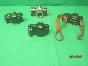 lot 227 image: 4 CAMERA BODIES MINOLTA, CANON EOS REBELX, CANON T50 AND SPOTMATIC ASAHI PENTAX