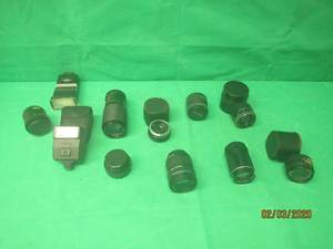 lot 228 image: 11 CAMERA LENS ,CAMERA FLASHES ,AND CAMERA LEN CASE SEE PICS FOR LENS BRAND