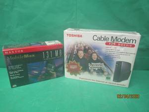 lot 247 image: TOSHIBA CABLE MODEM PCX DOCSIS &amp MAXTOR MOBILE MAX 131MB PCMCIA HARD DRIVE&nbsp