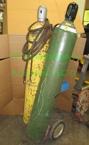 lot 1 image: Oxy Acetylene welding tanks and cart