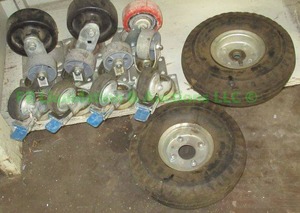 lot 12 image: Assorted commercial cart wheels as shown