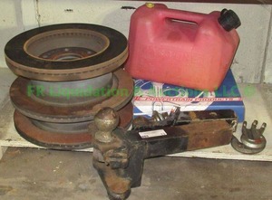 lot 13 image: Automotive parts including brake rotors, trailer hitch and more