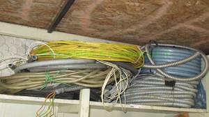 lot 53 image: Romex cable wire rolls plus flex conduit rolls