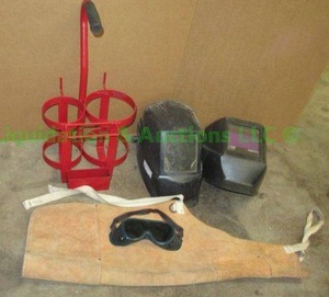 lot 55 image: Jackson welding helmets, portable welding bottle holder plus