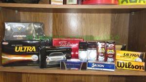 lot 64 image: Assorted golf balls many unused including Wilson, Callaway, Srixon & 35th rider cup commemoratives