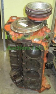 lot 99 image: Chevrolet 327 cid engine block with crankshaft and pistons installed, matches lot 132