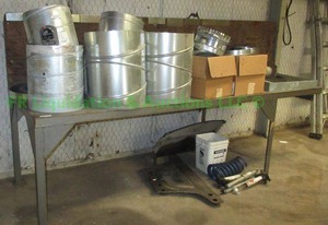 lot 163 image: Haevy duty Solid steel utility table 106 x 38 x 33, contents not included