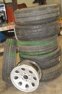 lot 179 image: Assorted automotive tires and rims as shown, 6 total