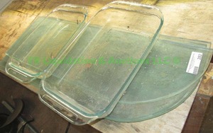 lot 282 image: Pyrex baking dishes and tempered glass shelves
