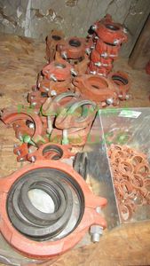 lot 298 image: Rigidlok assorted size iron couplings as shown