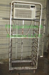 lot 308 image: LG air conditioning unit model LW8010ER with rolling storage rack