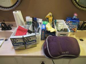 lot 53 image: HOMEDICS FOOT MESSAGER AND ALL TYPES OF OVER THE COUNTER BACK PAIN PATCHES AND MUCH MORE. BATHROOM CONTENTS