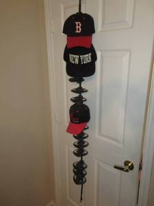 lot 70 image: HAT LOT INCLUDES DALLAS COWBOYS, REDHEAD, BOSTON RED SOX AND MANY MANY MORE WITH HAT HANGER