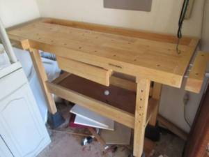 lot 78 image: WHITEGATE WOODWORKING BENCH WITH CENTER DRAWER AND 2 BUILT IN VISES 55 X 20 X 34 ALSO 49 HANGING FLOUESCENT SHOP LIGHT WITH PLUG NOT HARD WIRED