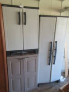 lot 82 image: 2 BLACK AND DECKER PLASTIC STORAGE CABINETS WITH CONTENTS 26 X 15 X 36 AND 1 LARGE PLASTIC STORAGE CABINET WITH CONTENTS 27 X 15 X 68