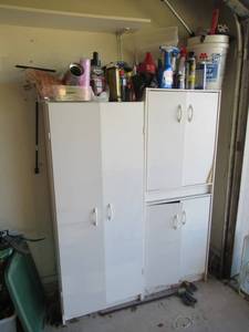 lot 85 image: 2 STORAGE CABINETS WITH ALL CONTENTS. 1 MEASURES 24 X 12 X 60 THE OTHER IS 24 X 12 X 63. LOTS OF GOODIES