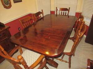 lot 135 image: SOLID WOOD TABLE WITH INSERT AND 6 MATCHING CHAIRS ALSO HAS TABLE COVER AS SHOWN IN LAST PICTURE