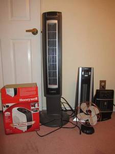 lot 141 image: HONEYWELL 2 POSITION HEATER, LASKO AIR PURIFIERFAN, SAFEHEAT HEATER, HONEYWELL HEATER AND SMALL FAN