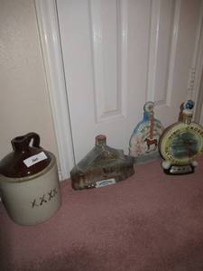 lot 160 image: BING CROSBY GOLF NATIONAL PRO-AM JIM BEAM COLLECTORS BOTTLE, CHURCH HILL DOWNS KENTUCKY DERBY JIM BEAM COLLECTORS BOTTLE, PONEROSA RANCH JIM BEAM COLLECTORS BOTTLE AND MOONSHINE JUG