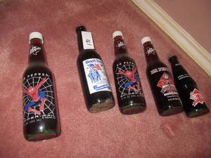 lot 171 image: DR. PEPPER COLLECTABLE BOTTLES 2 SPIDERMAN, DESERT STORM, 2 BALL PARK IN ARLINGTON BOTTLES