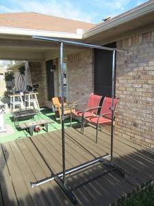 lot 177 image: METAL CLOTHES RACK 58 X 70 AND SHOWER POLE