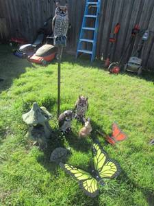 lot 196 image: YARD ART INCLUDES 3 OWLS 15 TALL, CEMENT MUSHROOMS, TURTLE, RABBITAND BUTTERFLIES