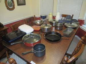 lot 123 image: KITCHEN LOT INCLUDES CAST IRON SKILLET, POTS, PANS, COFFEE PITCHERS, COMPLETE PYREX SET AND MORE