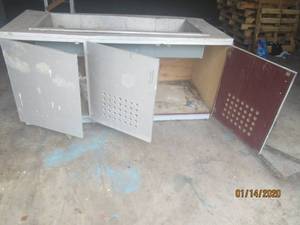 lot 118 image: 2 DOOR WOOD CABINET WITH METAL TOP OPENING ON WHEEL&nbsp70L X 30D X 3FT H&nbsp