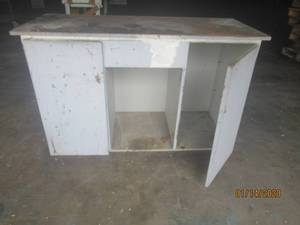 lot 119 image: 2 DOOR WOOD CABINET ON WHEELS&nbsp57.5L X 24D X 37.5 H&nbsp