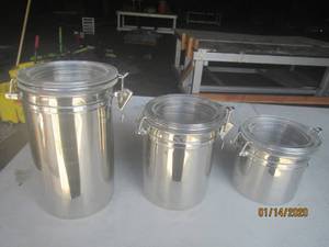 lot 148 image: STAINLESS STEEL CANISTER SET