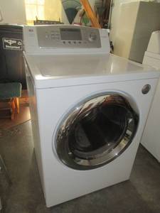 lot 7 image: LG ELECTRIC DRYER MODEL# DLE0442W 27 FRONT LOAD WITH 7.3 CU. FT. CAPACITY, 9 DRYING PROGRAMS, 6 DRYING OPTIONS, STAINLESS STEEL DRUM AND DRYING RACK