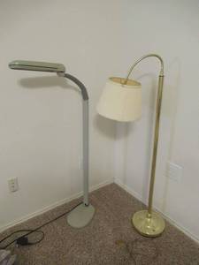 lot 9 image: OTT-LITE STANDING LAMP AND BRASS LOOKING STANDING LAMP