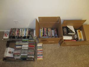 lot 19 image: VINTAGE WESTERN MOVIES ON DVD, CDS, CASSETTES AND BOOKS