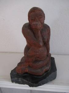 lot 45 image: HAND CARVED IRON WOOD STATUE ON MARBLE BASE 7 12 TALL
