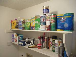 lot 57 image: SHELF LOT INCLUDES HOUSEHOLD CLEANERS, FLASHLIGHTS AND MORE AS SHOWN