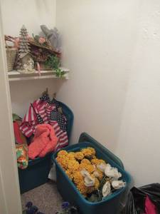 lot 67 image: FAUX FLOWERS, PLASTIC CONTAINERS, AMERICAN FLAGS, AFGHANS, LUGGAGE AND MORE
