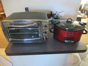 lot 75 image: CROCK POT(NEVER USED), CROCK POT LITTLE DIPPER, AND OSTER TOASTER OVEN