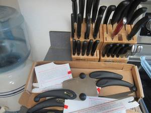 lot 78 image: MIRACLE BLADE KNIFE SETS, MIRACLE II KNIFE SET, CUTTING BOARDS, ROLLING PIN, BAKING PANS, STRAINERS, UTENSILS AND MORE